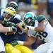 Michigan State RJ Williamson and Denicos Allen wrap up Michigan wide receiver Drew Dileo during the second quarter against Michigan State at Michigan Stadium on Saturday afternoon. Melanie Maxwell I AnnArbor.com